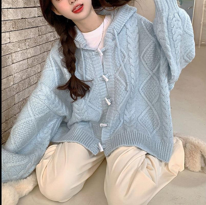Cardigan surdimensionné pour femmes avec capuche et motif en tricot torsadé Chic & Stil