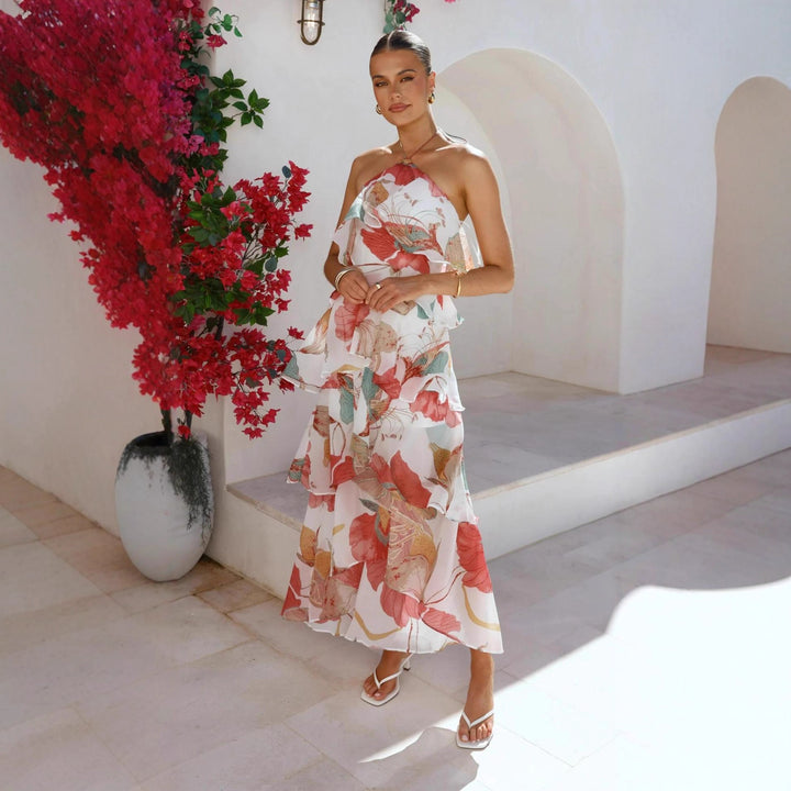 Chic & Stil Women's maxi dress with elegant overlay and floral ruffles