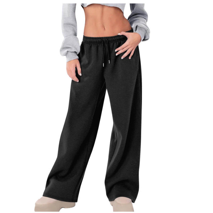 Women's loose casual pants with elastic waistband and side pockets Chic & Stil