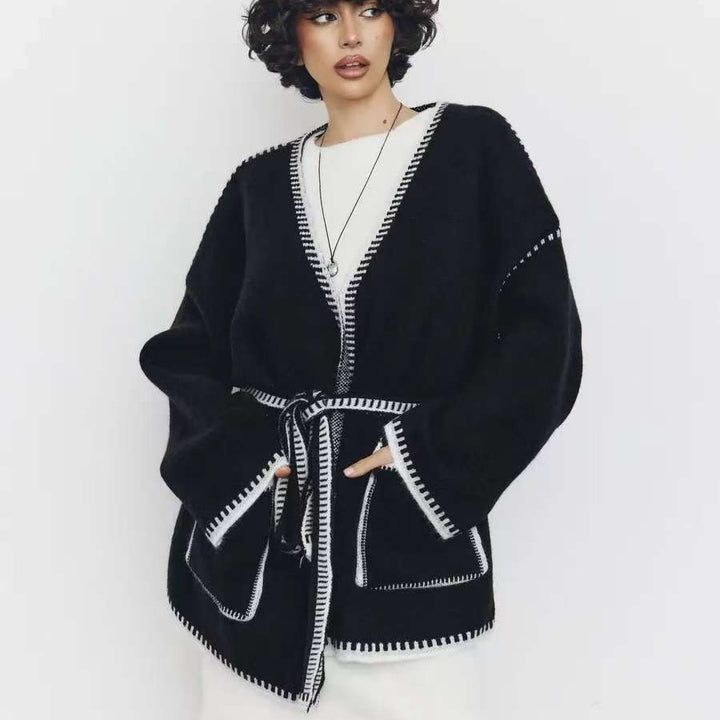 Thick knitted coat for women with practical belt and pockets Lune London