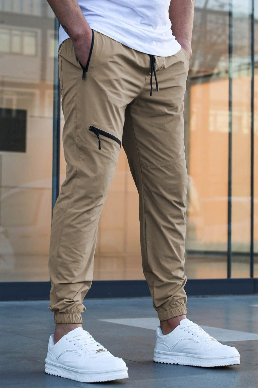 Sport suit trousers for men with elastic waistband and zip pockets on the sides Lune London