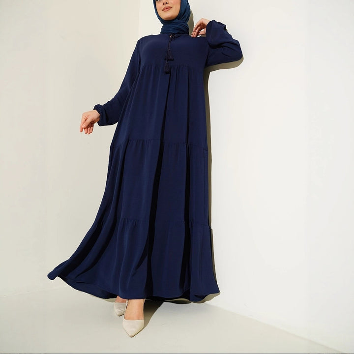 Maxi dress for women with voluminous skirt and fine fringes Lune London