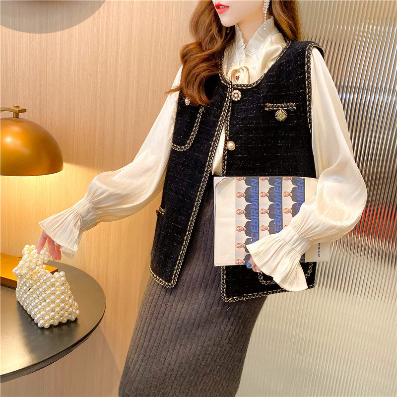 Gilet pour femmes avec des boutons élégants et un design texturé Chic & Stil