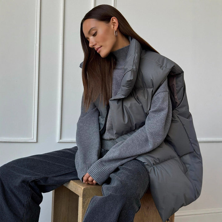 Ladies padded vest with high collar and practical side pockets Lune London