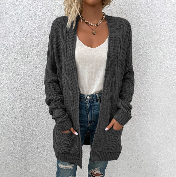 Thick knit cardigan for women with large pockets and structured design Lune London