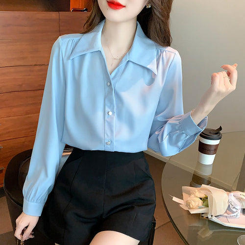 Blouse élégante pour femmes avec des détails classiques Chic & Stil