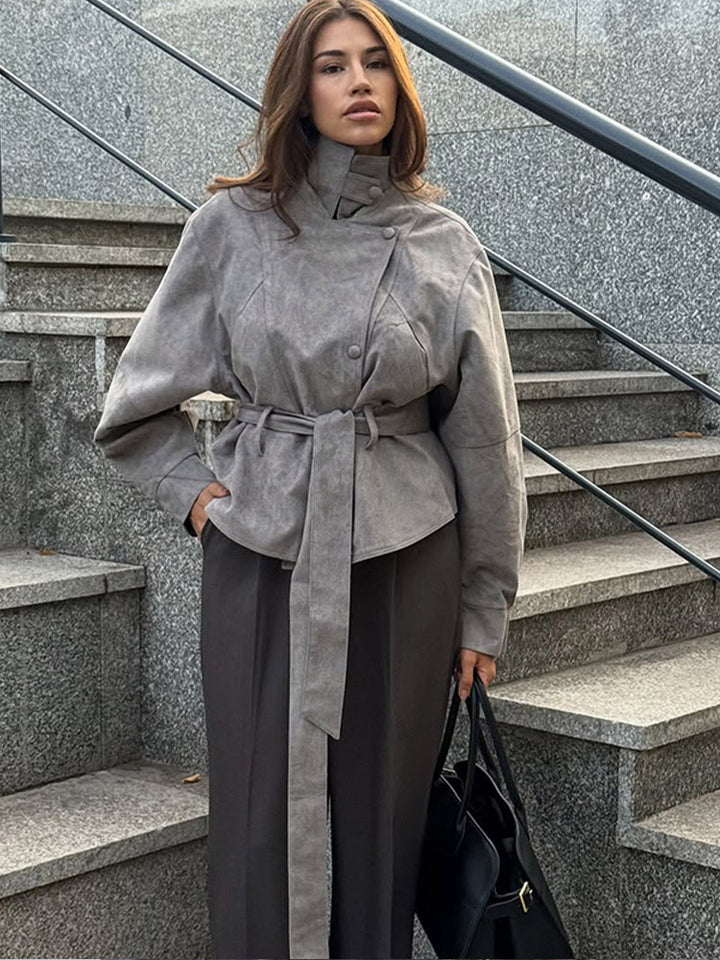 Women's short jacket made of faux suede with a high stand-up collar, waist belt, and boxy oversized silhouette Amarae
