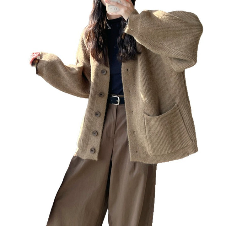 Cardigan en tricot épais pour femmes avec des détails de boutons élégants et des poches pratiques Chic & Stil