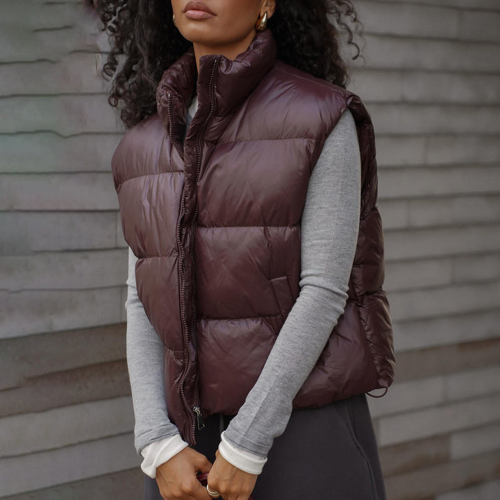 Quilted women's vest with high collar and practical zipper Amarae