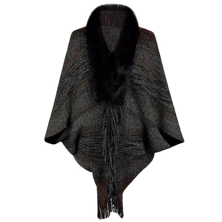 Elegant poncho for ladies with luxurious faux fur collar and fringed hem Lune London