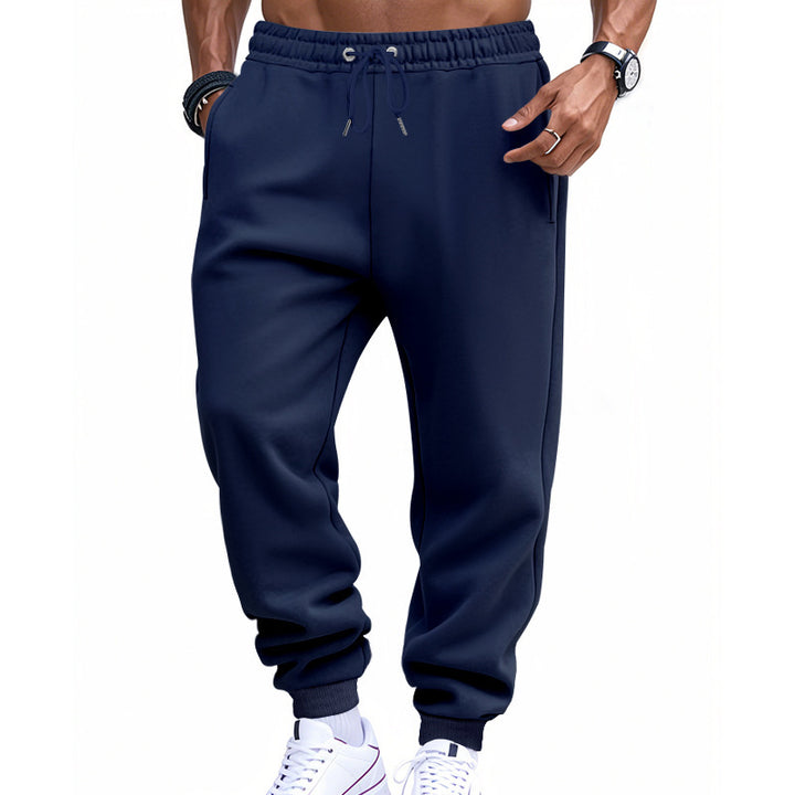 Comfortable sports pants for men with elastic waistband and practical side pockets Lune London