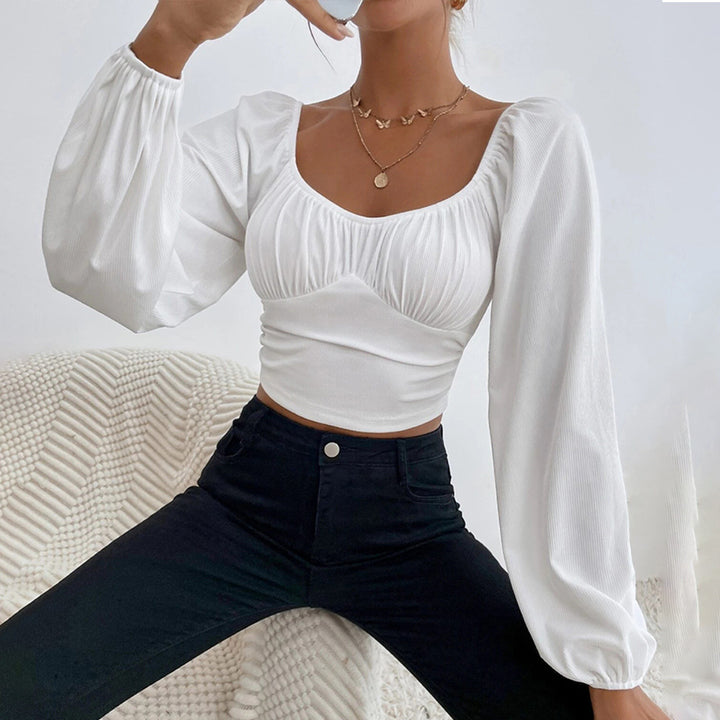 Haut court pour femmes avec un design de manches bouffantes élégant et une coupe ajustée Chic & Stil