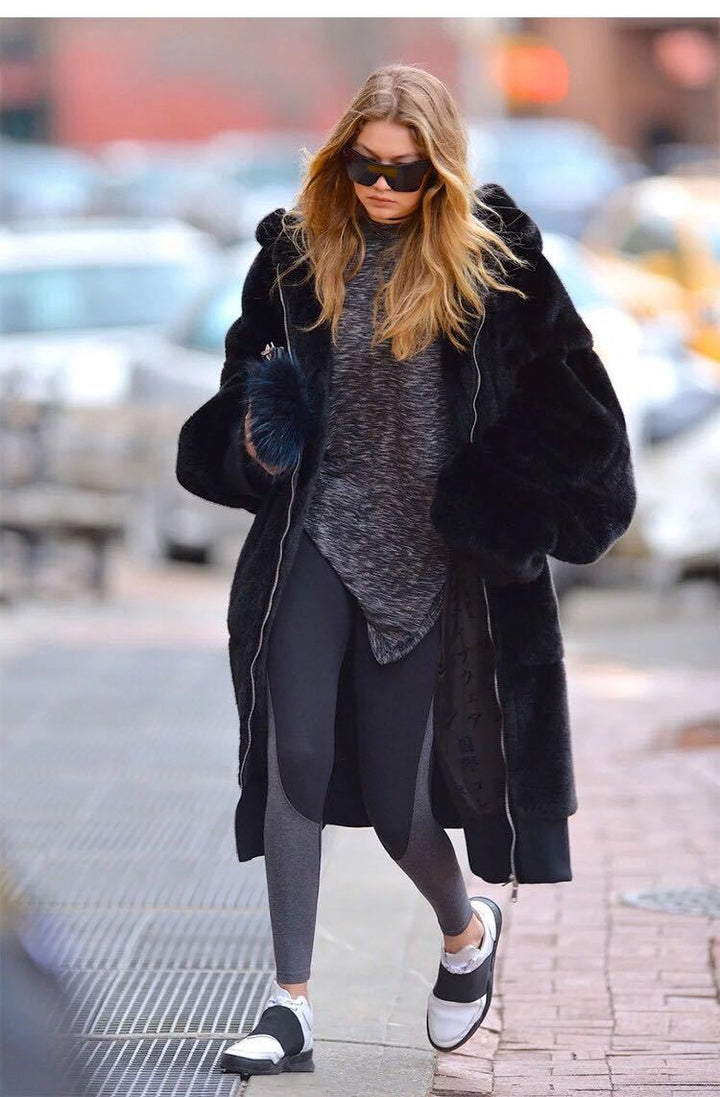 Oversized faux fur coat for women with hood and pockets Lune London