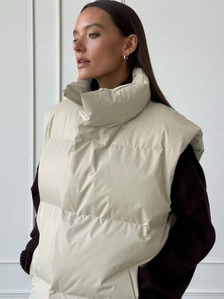 Ladies padded vest with high collar and pockets Amarae
