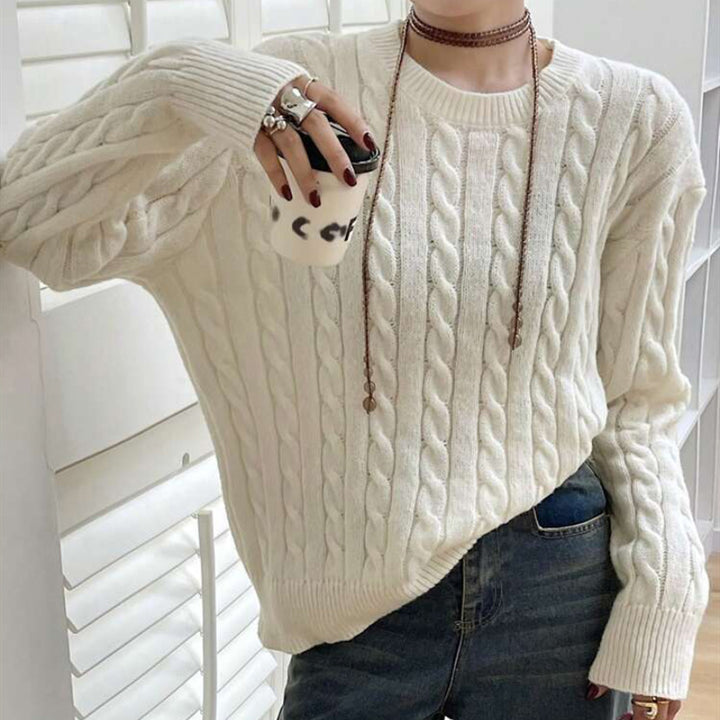 Chunky knit sweater for ladies with cable pattern and wide sleeves Lune London