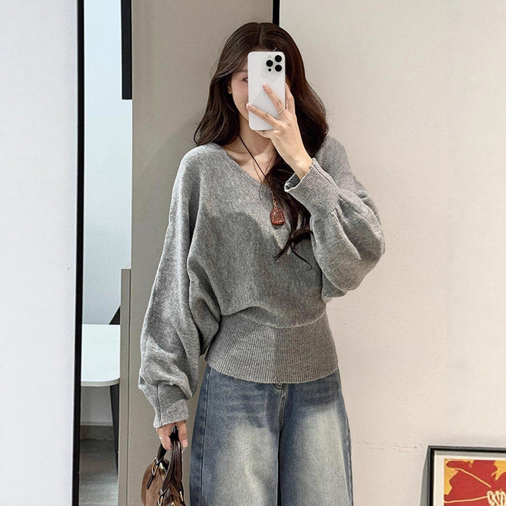 Pull féminin ample avec ceinture ajustable et décolleté en V Chic & Stil