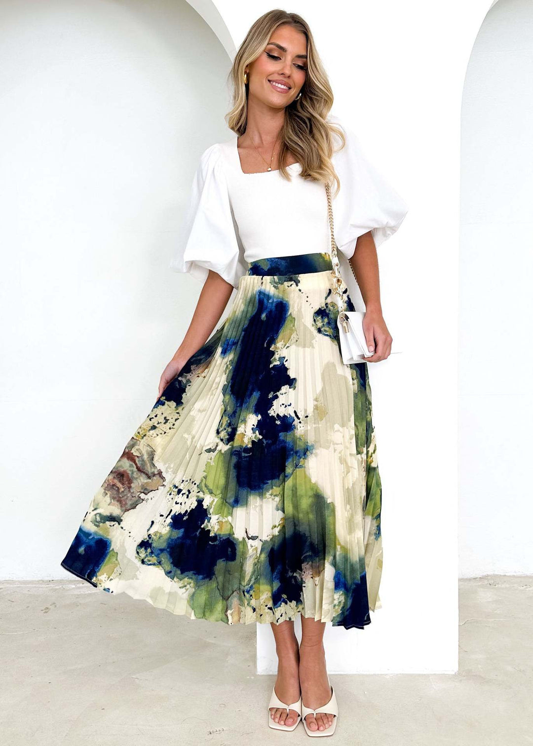 Ladies Elegant Pleated Skirt with Floral Design and Elastic Waistband Lune London