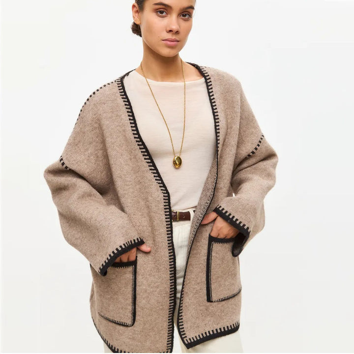 Loose fit knitted women's jacket with decorative belt Lune London