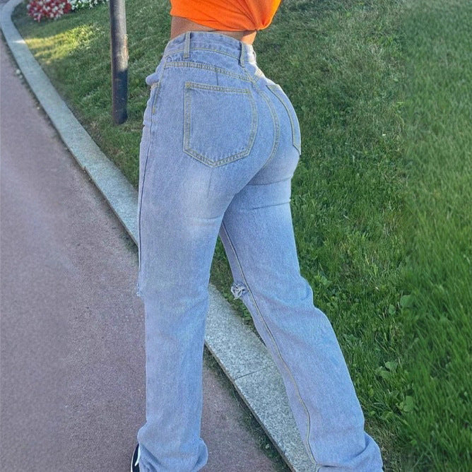 Women's high-waisted jeans with straight leg, knee rips, and stacked hem Amarae