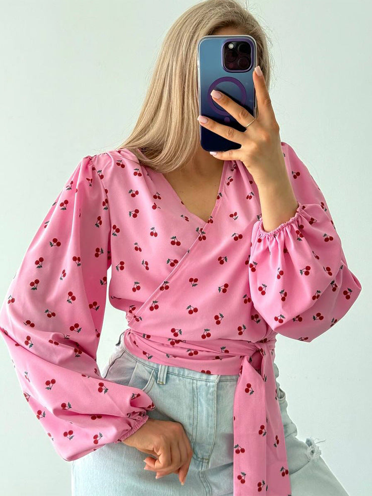 Women's wrap blouse with cherry print, wide puff sleeves & tie belt Amarae