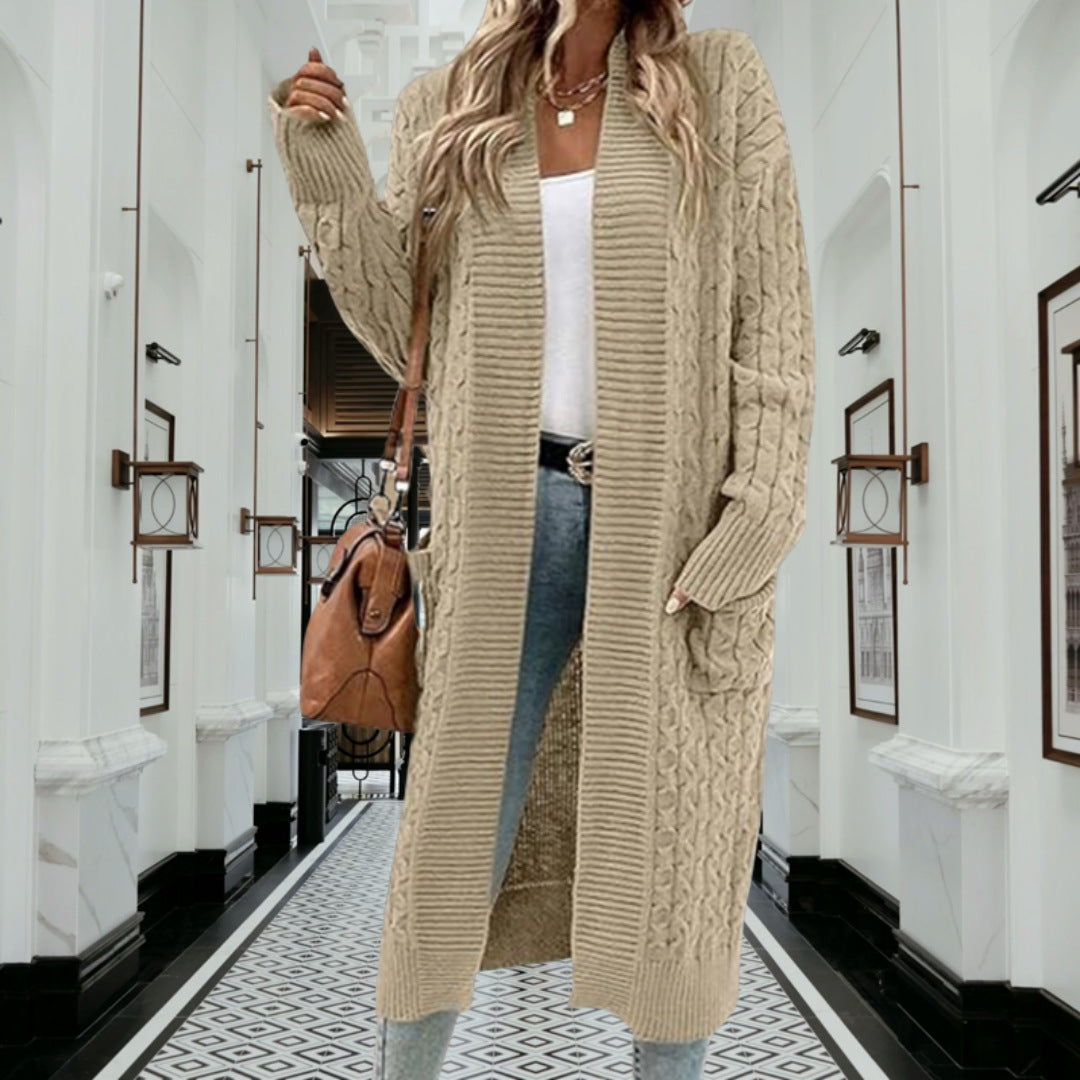 Women's knitted jacket with chunky braid design and practical pockets Lune London