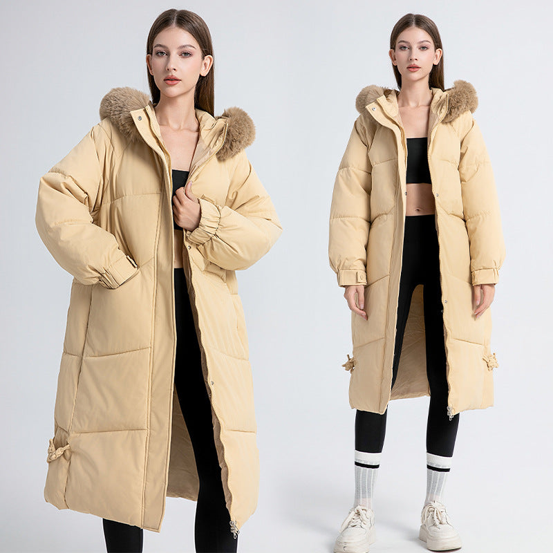 Long winter coat for women lined with removable faux fur collar and practical drawstrings Lune London