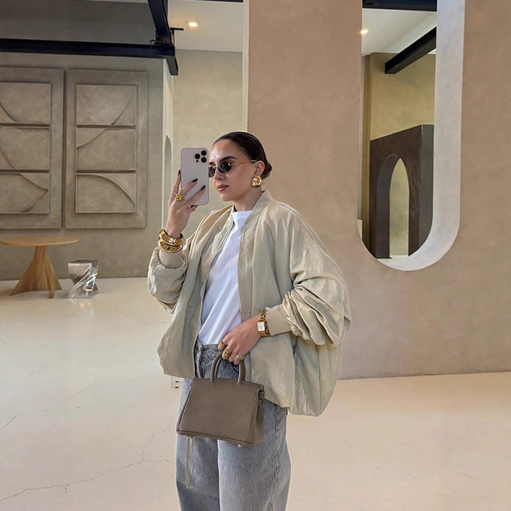 Women Oversize Bomber Jacket with drawstring, ribbed cuffs and lightweight nylon finish Amarae