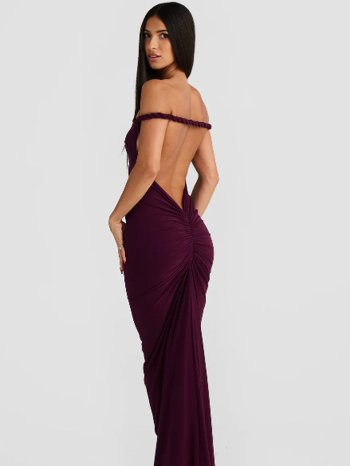 Women figure-hugging evening dress with elegant halter design and swinging hem Lune London