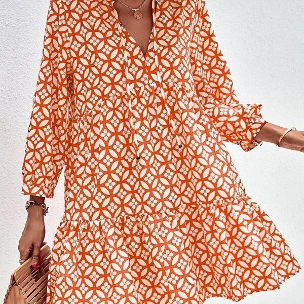 Boho style summer dress for women with a flowy cut and ruffle details Lune London