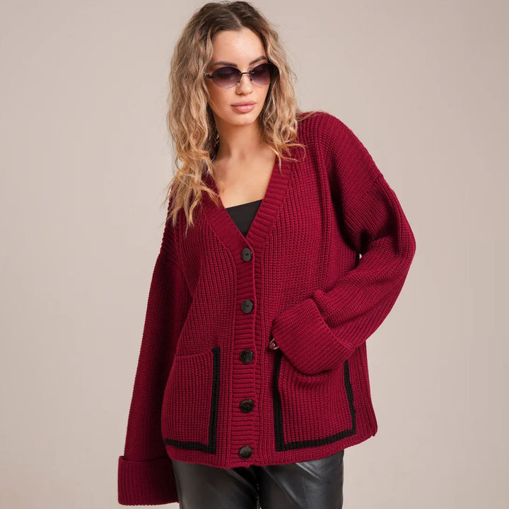 Ladies chunky knit cardigan with large pockets and decorative button Lune London