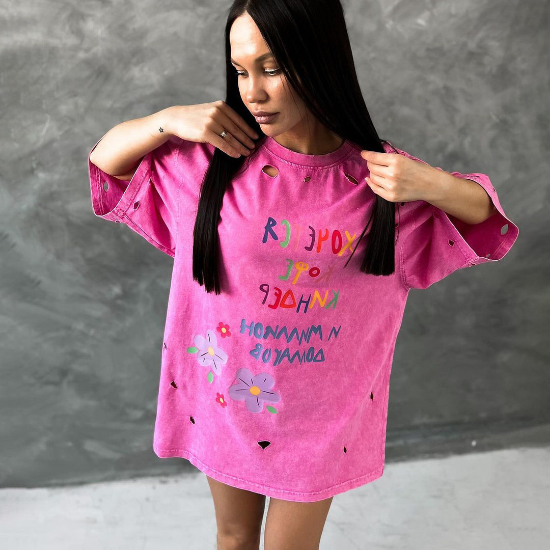 Oversized T-shirt dress for women with a unique graphic tear design Lune London