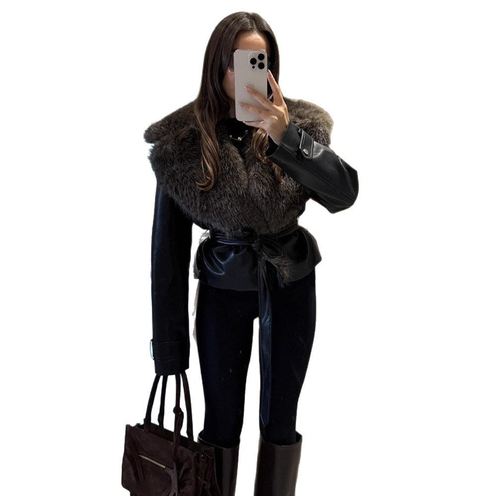 Women's short jacket in biker blouson style made of imitation leather with voluminous faux fur shawl collar and waist belt Amarae