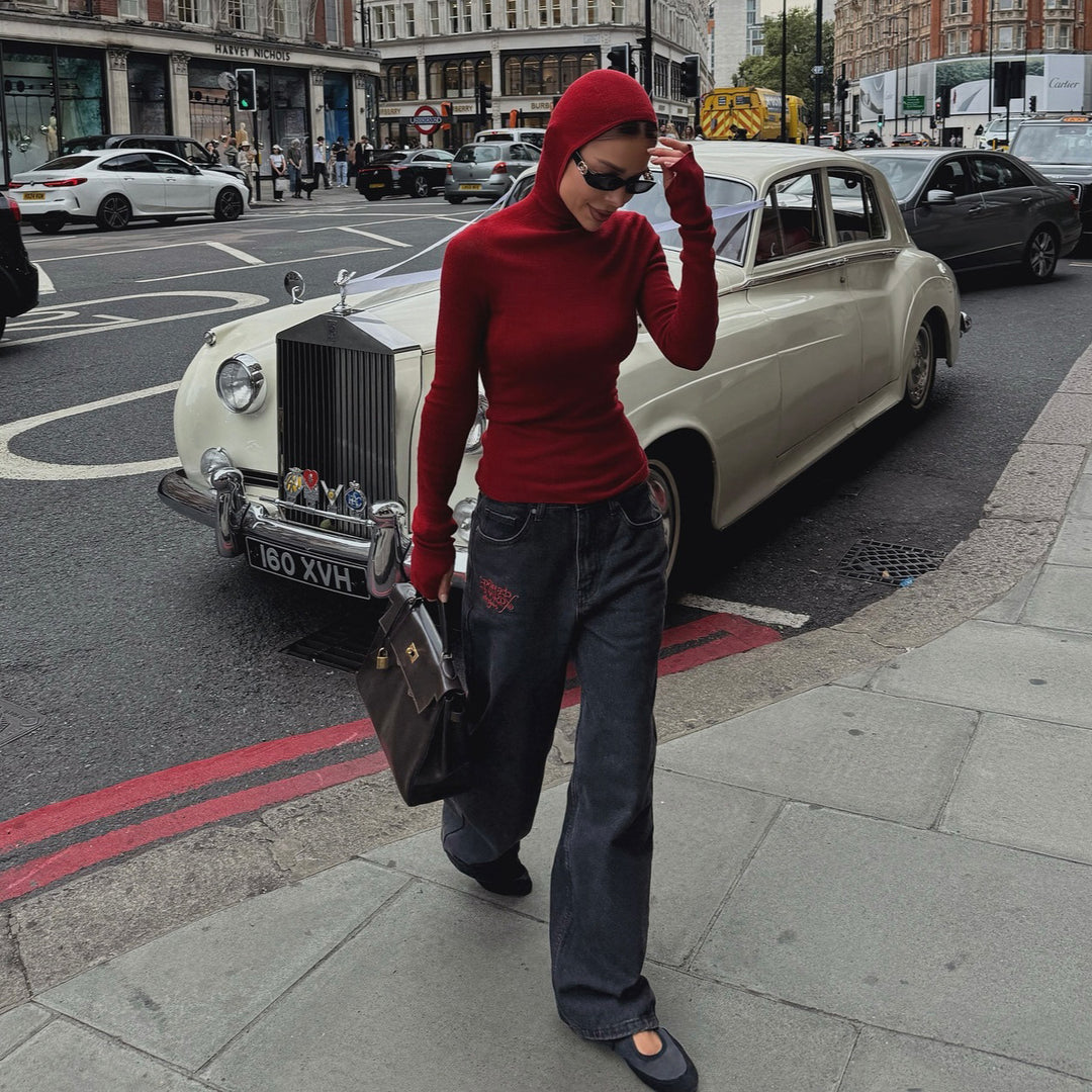 Women's fitted long sleeve top with high collar and thumb openings Lune London