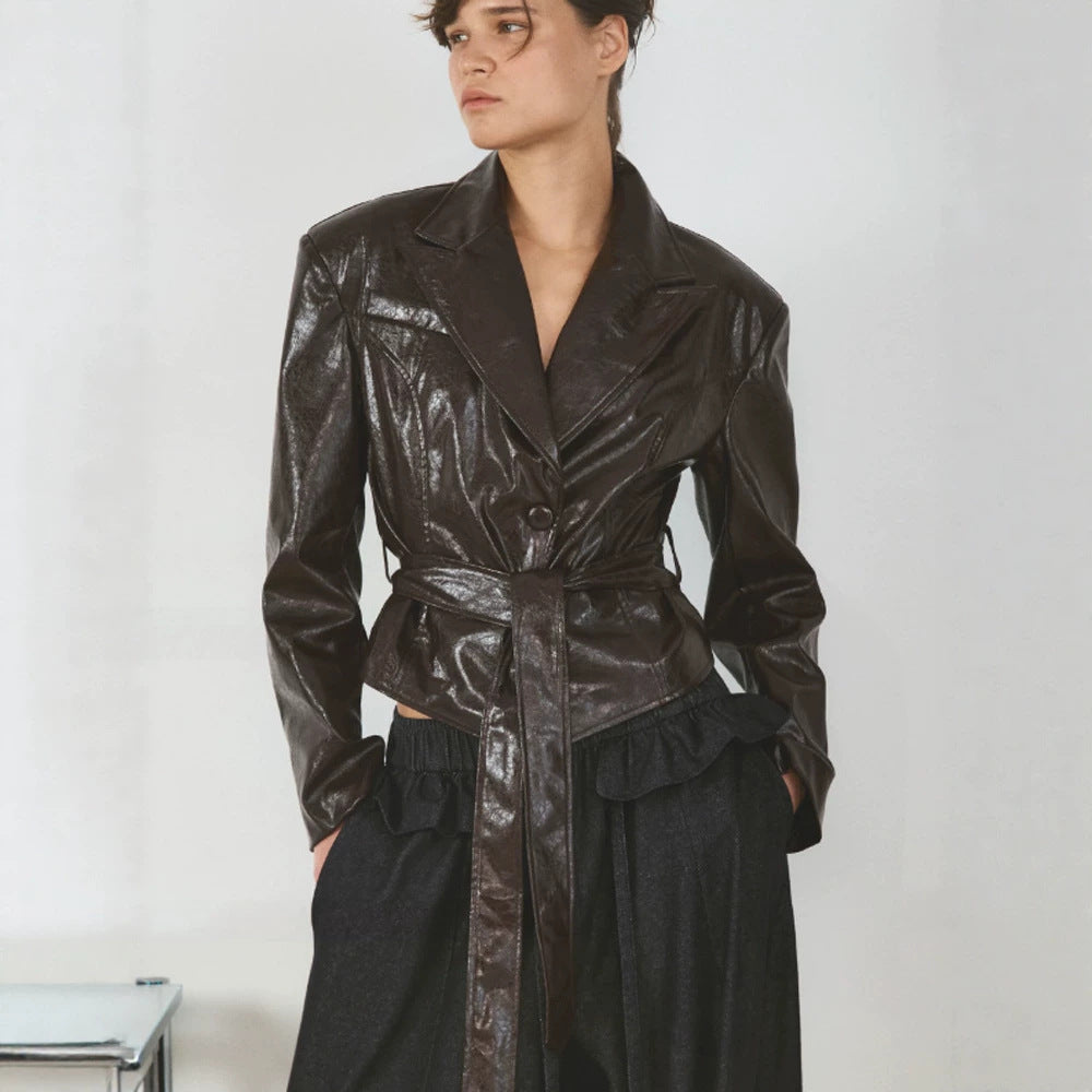 Women’s short blazer in patent leather look with waist belt and flowing lapel Amarae