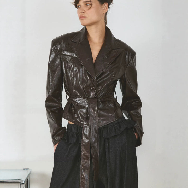 Women’s short blazer in patent leather look with waist belt and flowing lapel Amarae