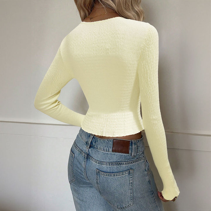 Haut enroulé élégant pour femmes avec des détails volantés et décolleté en V profond Chic & Stil