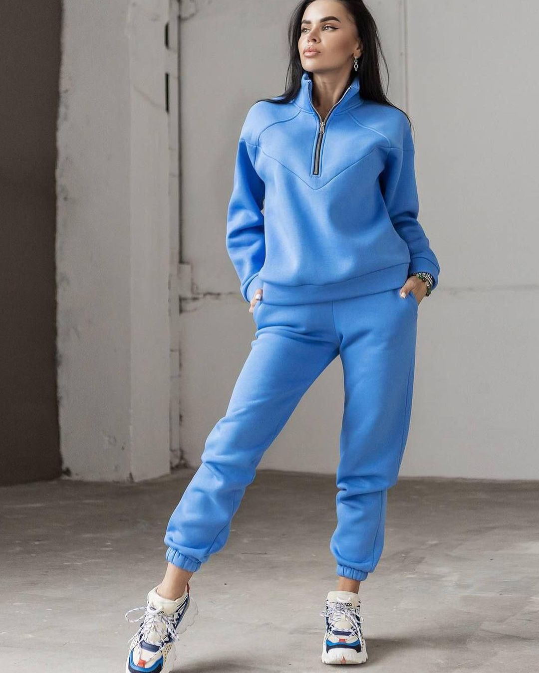 Women's sports training jacket with high collar and practical pockets Lune London