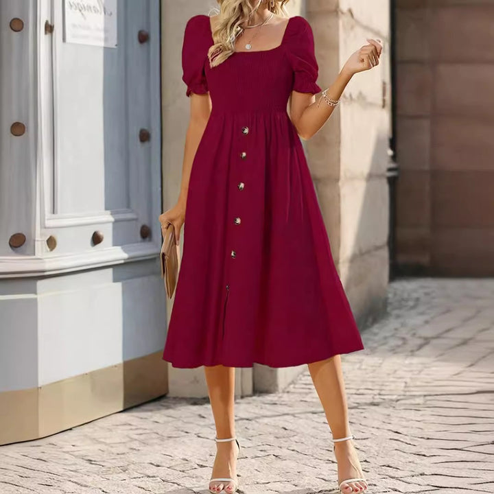Midi dress with buttons on the front and puff sleeves Lune London