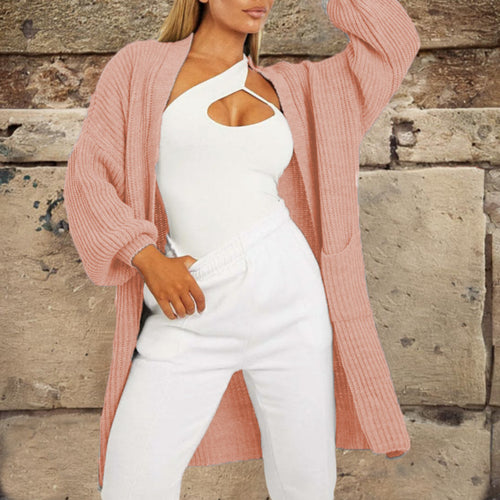 Thick knit cardigan for women with a relaxed fit and practical pockets Amarael