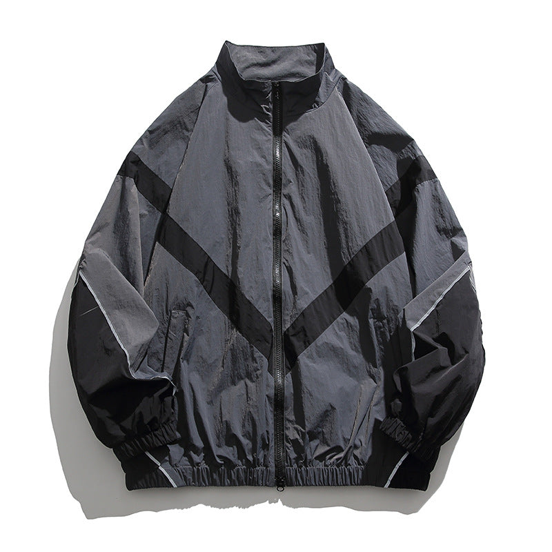 [Unisex] Oversize technical wind and rain jacket with stand-up collar, reflective piping, and elastic hem Amarae