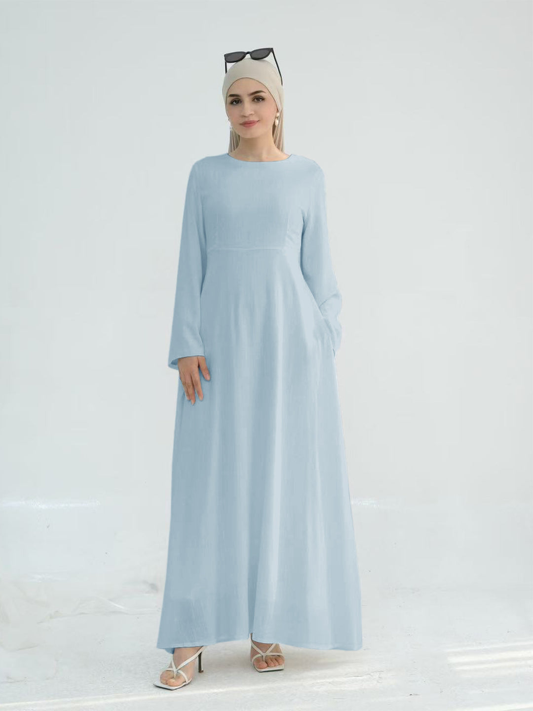 Elegant maxi dress for women with long sleeves and side pockets Lune London