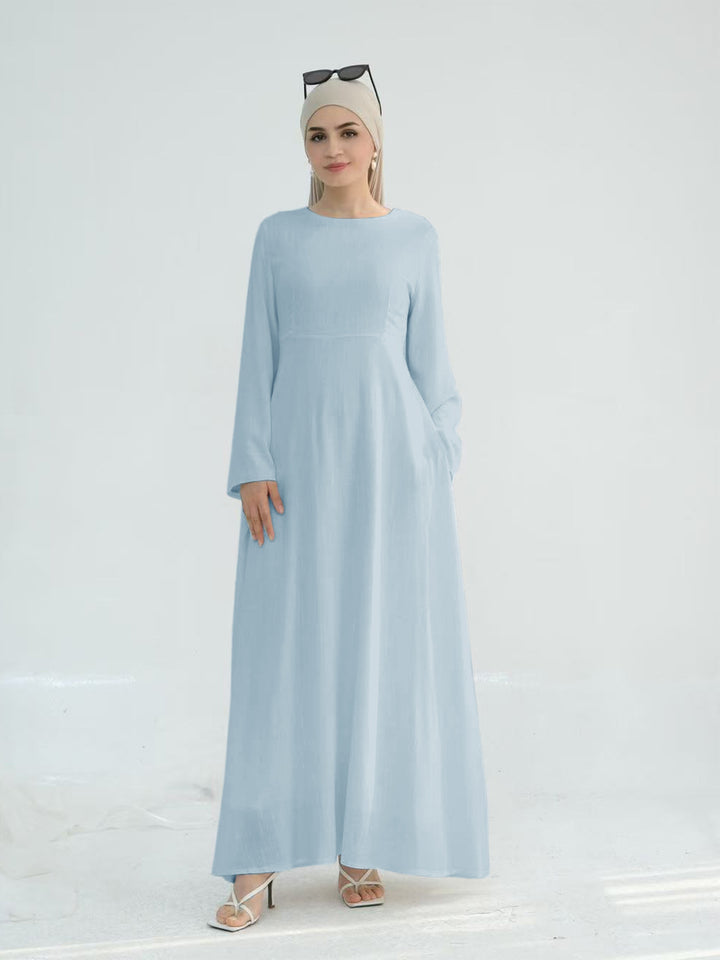 Elegant maxi dress for women with long sleeves and side pockets Lune London