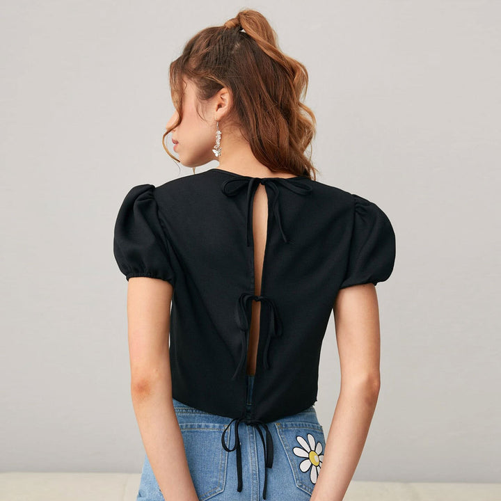 Haut court pour femmes avec manches bouffantes et col rond doux Chic & Stil