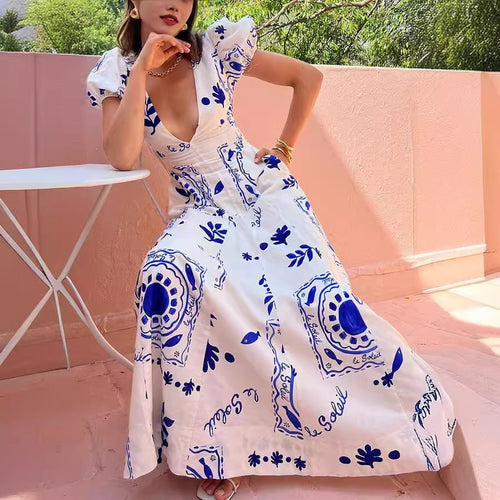 Maxi dress for women with voluminous puff sleeves and floral patterns Amarae
