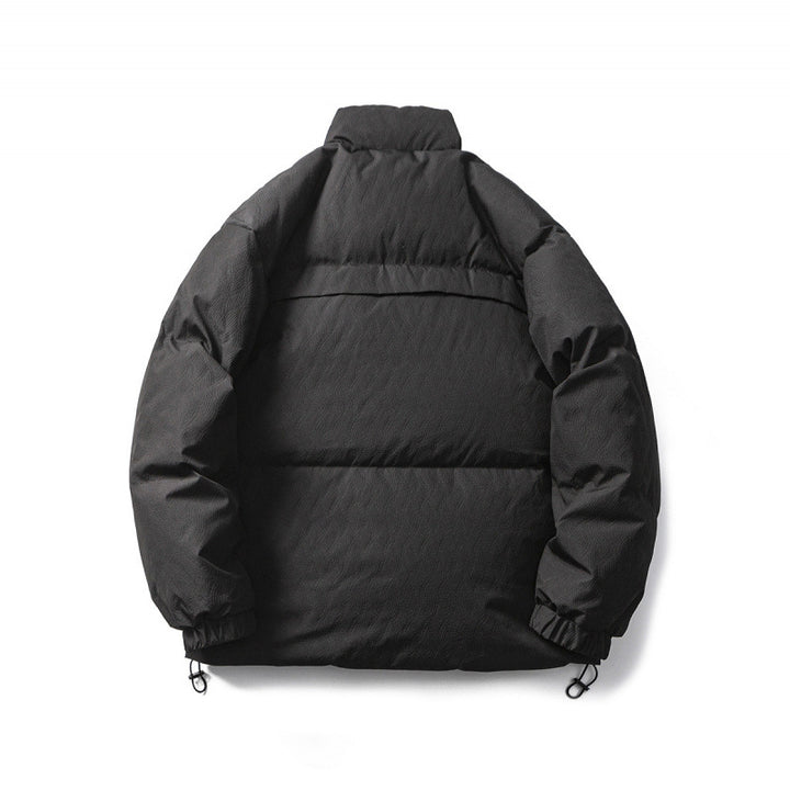 Unisex Kastig padded stand-up collar jacket with tree embroidery, chest flap pocket and drawstring hem Amarae