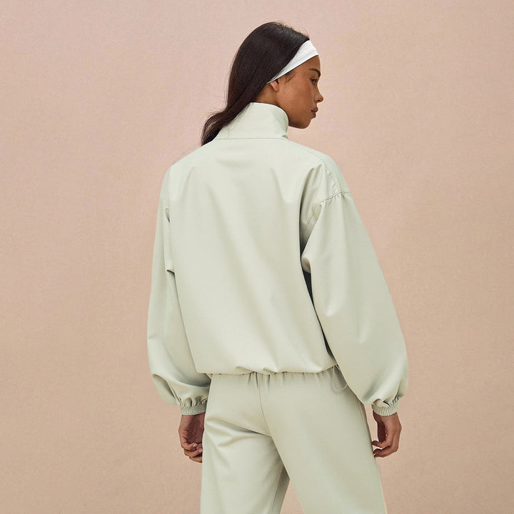 Veste fonctionnelle sportive pour femmes avec poignets de manches élastiques et pantalon ample Chic & Stil