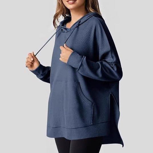 Oversized women's hoodie with side slits and practical pockets Lune London