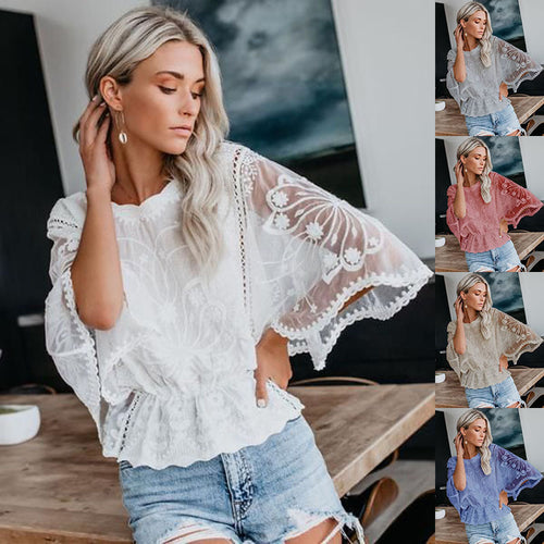 Blouse en dentelle élégante pour femmes avec des manches volumineuses Chic & Stil