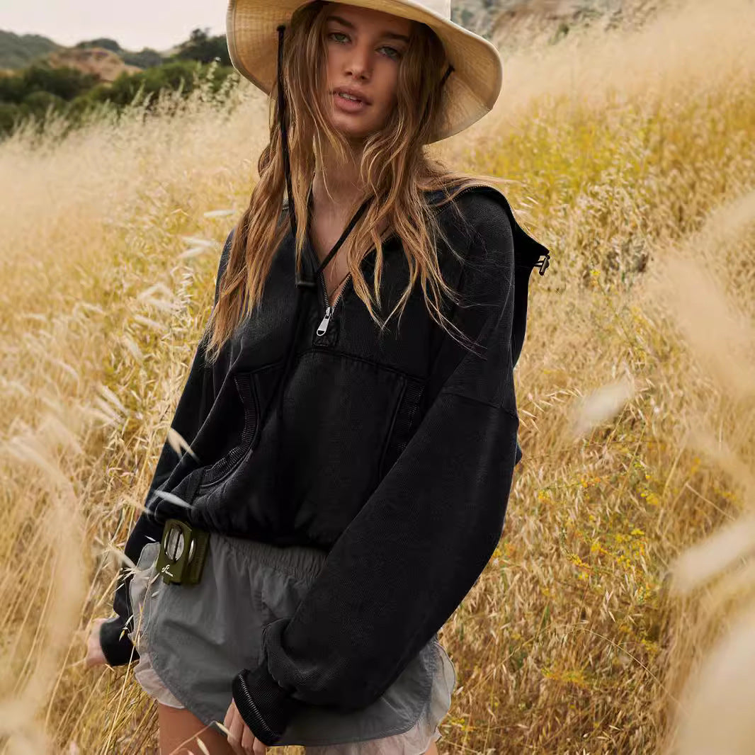 Urban hoodie for women with half zipper and practical kangaroo pocket Lune London