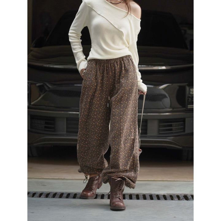 Women Asymmetrical Off-Shoulder Fine Knit Top with Twisted Hem Amarae